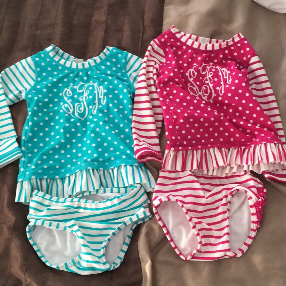 Ruffle Butts two swim suits pink and green